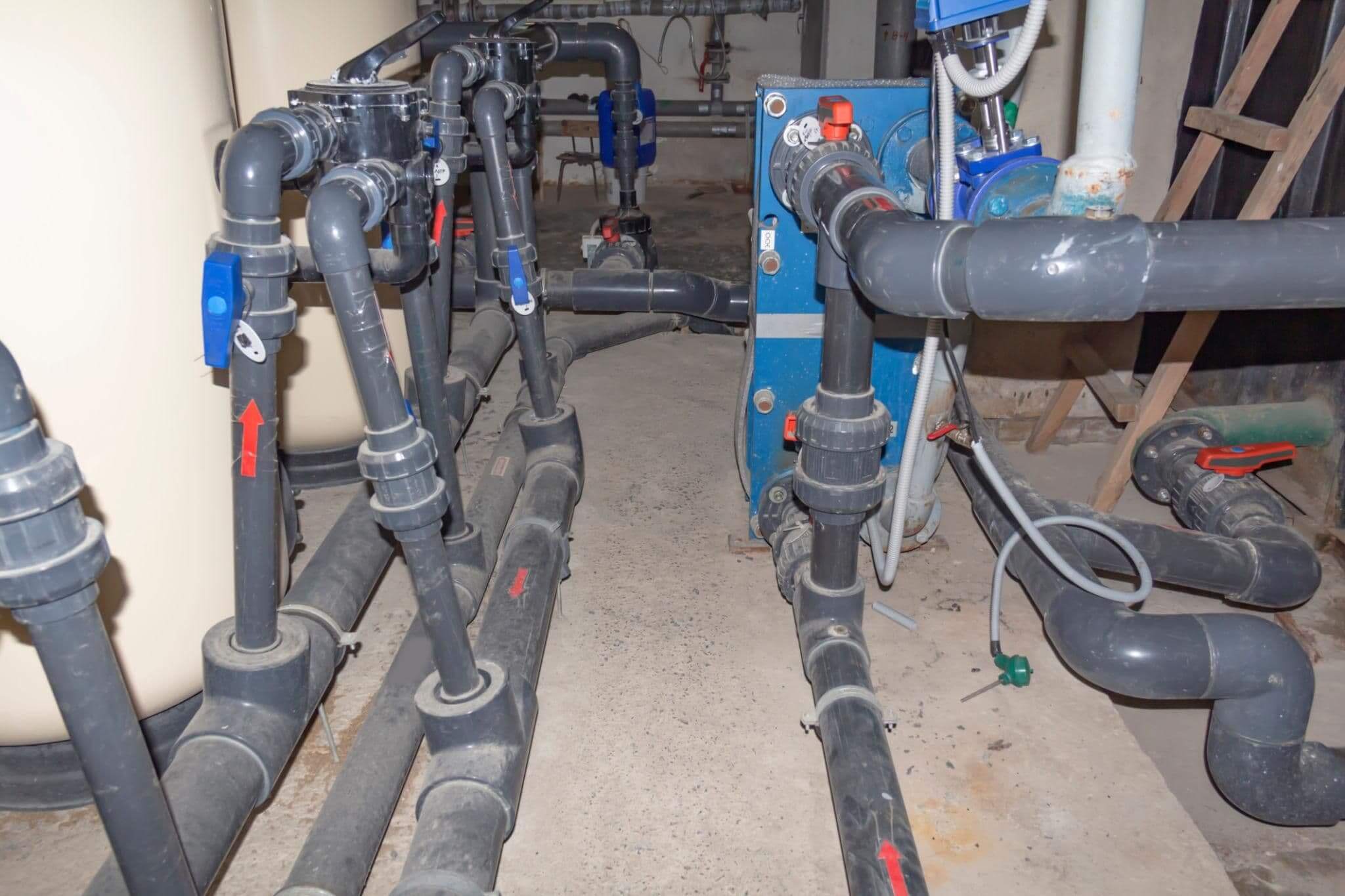 Plastic pipe systems in a manufacturing plant demonstrating plastic pipe benefits for manufacturing.