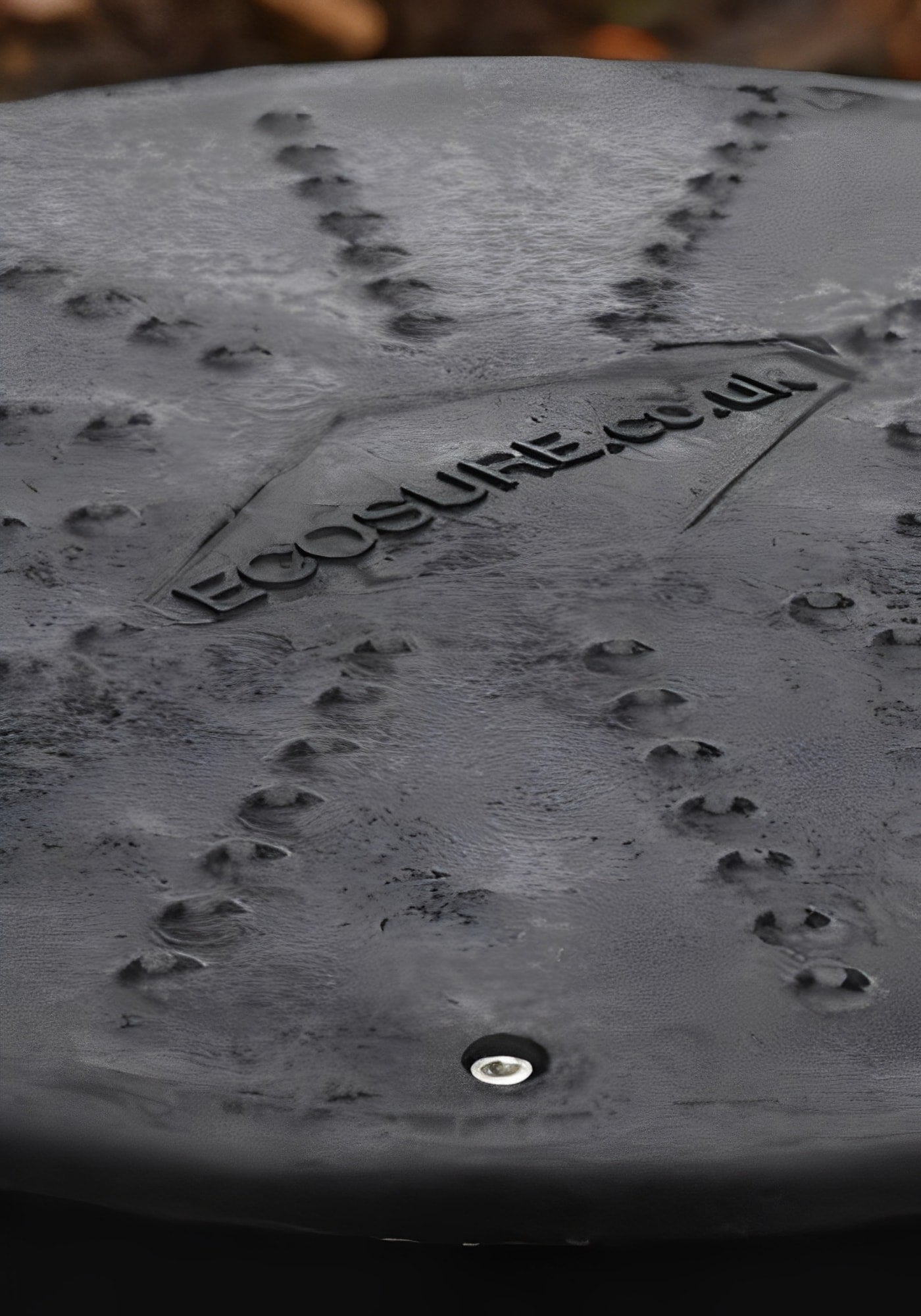 Cover of a 1000 Litre Underground Water Tank by PipeTech with textured surface and logo.