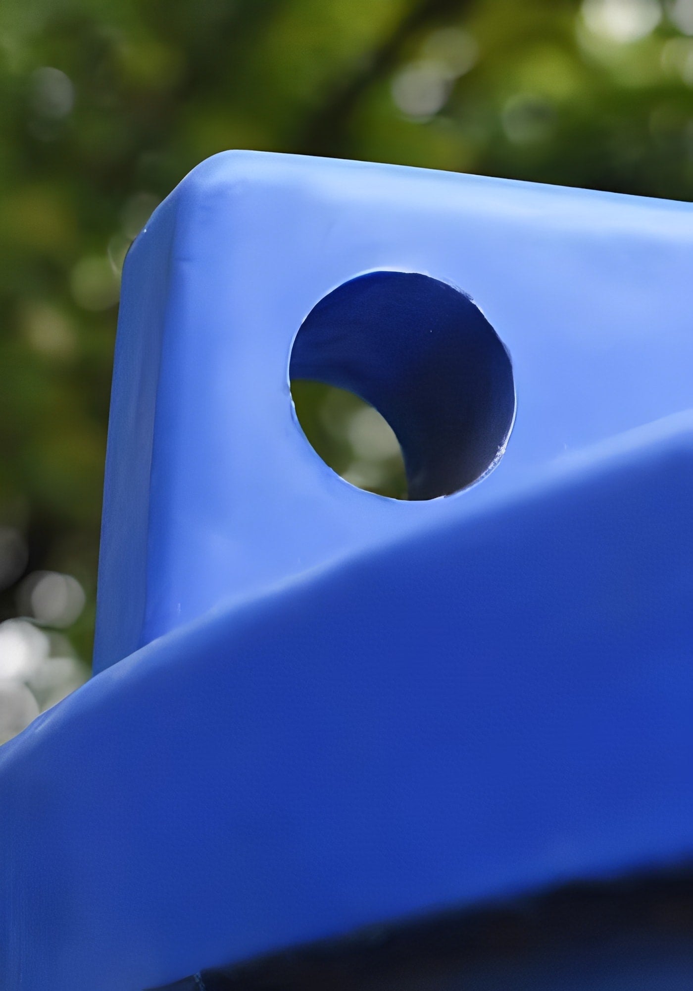 Close-up of the corner and hole of a 10000 Litre Water Tank Blue - Potable for safe water storage.