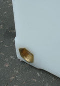 Close-up of the brass threaded outlet on a 280 Litre Natural Water Tank for secure plumbing.