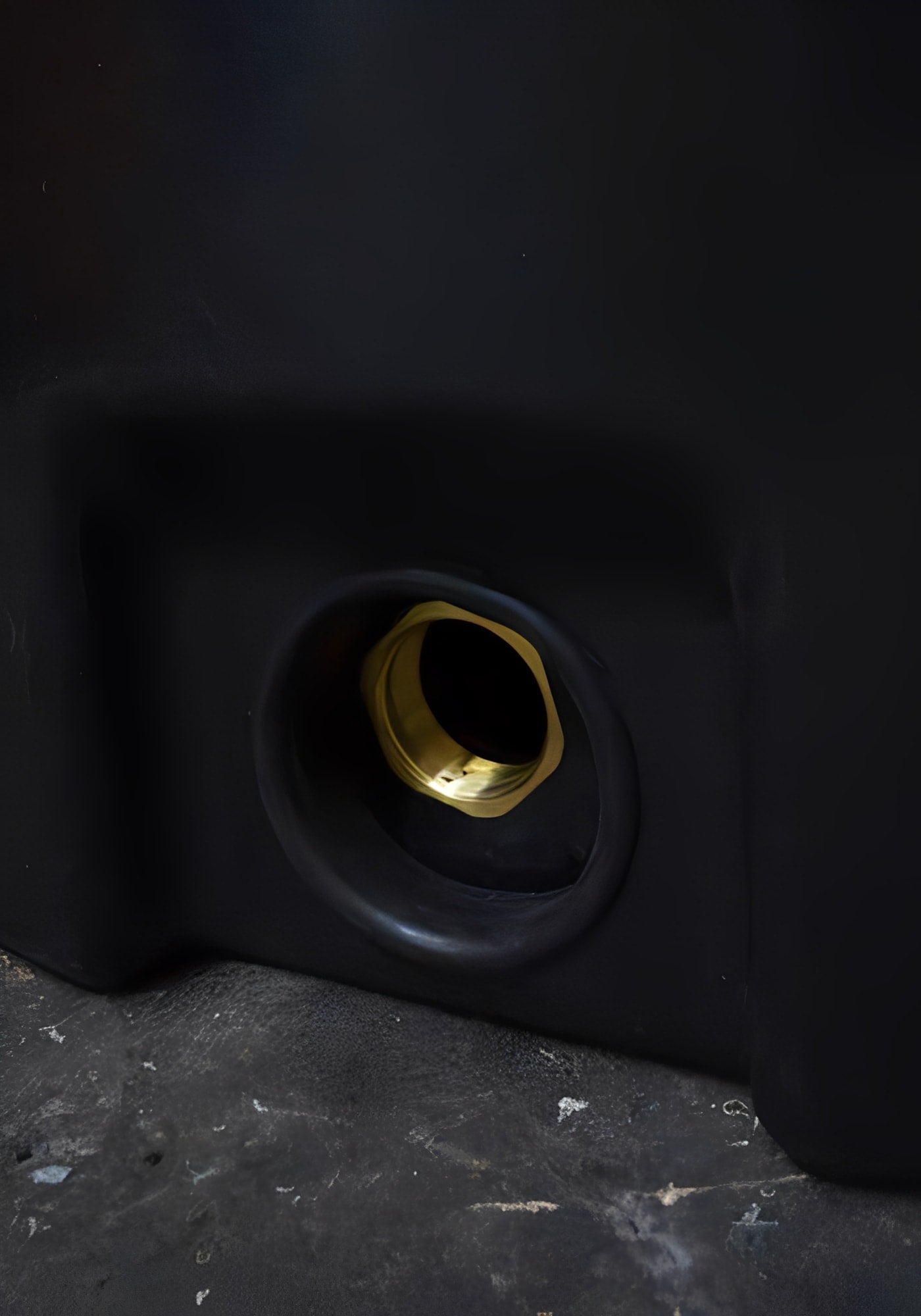 Close-up view of the outlet fitting on the 5000 Litre Insulated Non Potable Water Tank.