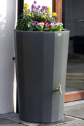 Green Marble Midi Metropolitan Water Butt Planter - 165L with colorful flowers and water tap feature