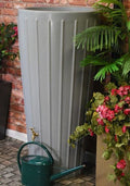 Grey Cosmo 200L Water Butt Planter - Decorative Grey MDPE with plants and watering can.