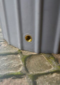 Close-up of the Grey Cosmo 200L Water Butt Planter - Decorative Grey MDPE showing the drainage hole.