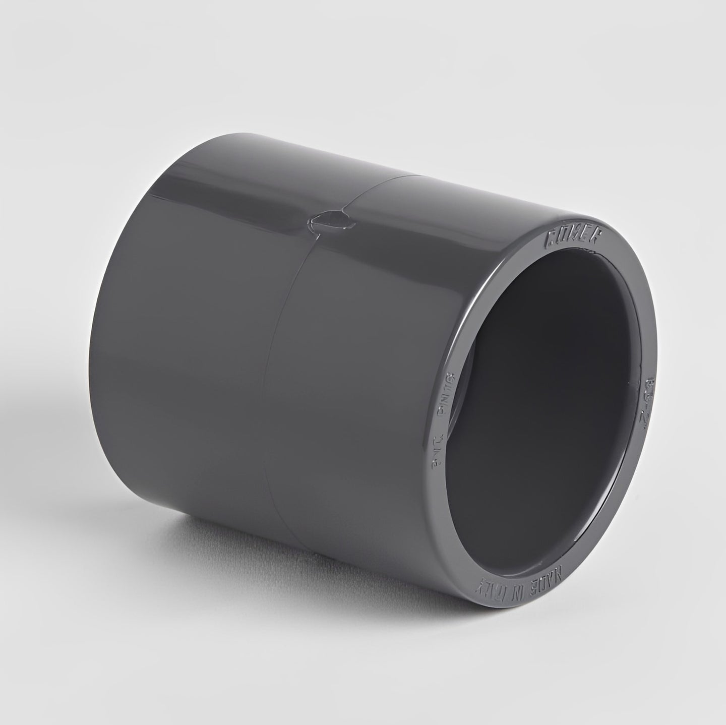 PVC Imperial to Metric Adaptor Socket - Pressure Pipe Fitting in gray color, designed for seamless pipework conversion.