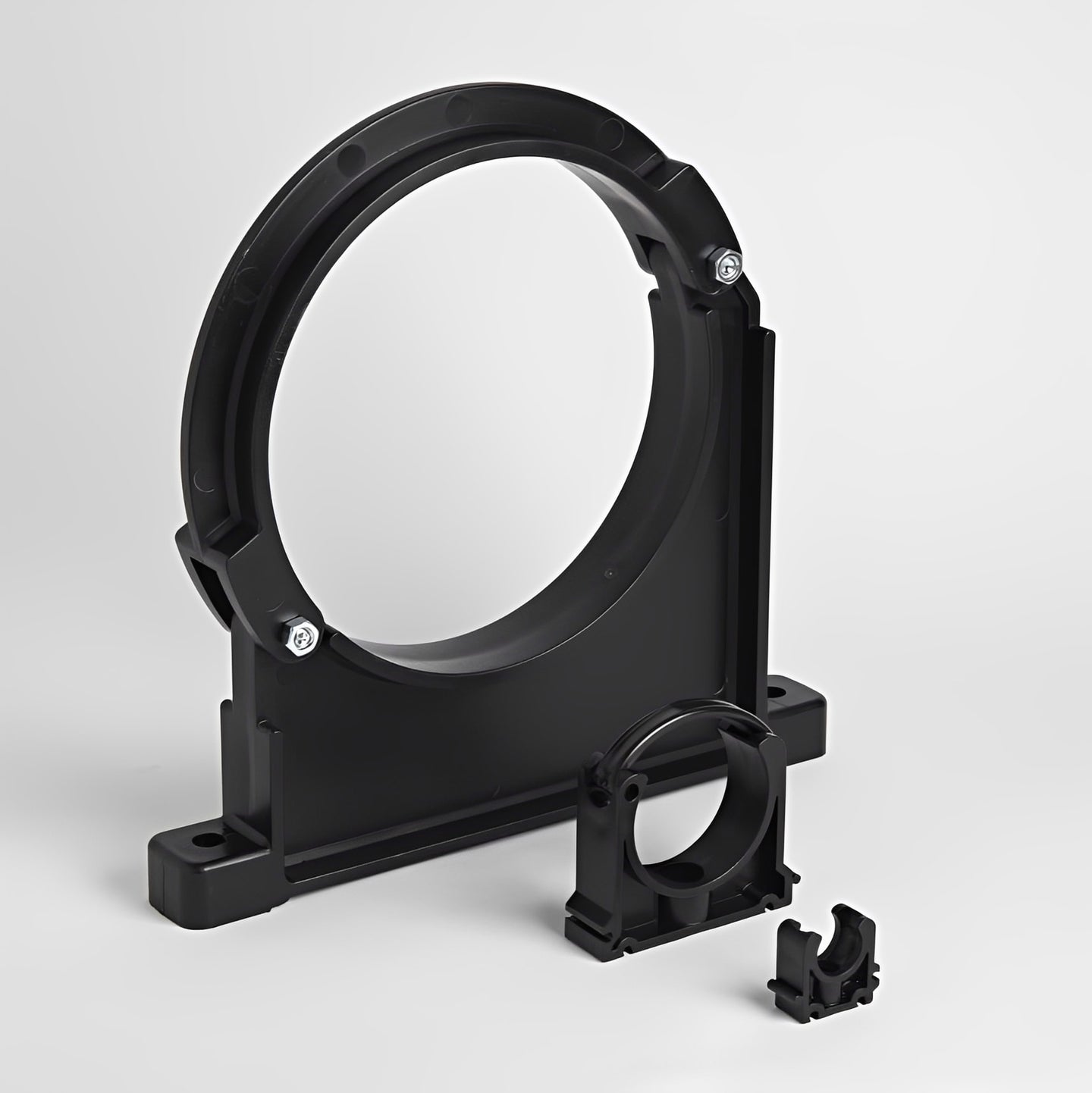 Industrial Pipe Clip - Black PP Metric PVC Pipe Bracket for securing pipes to surfaces.