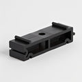 Industrial Spacing Block - Black Polypropylene for PVC pipe clearance and valve installation.