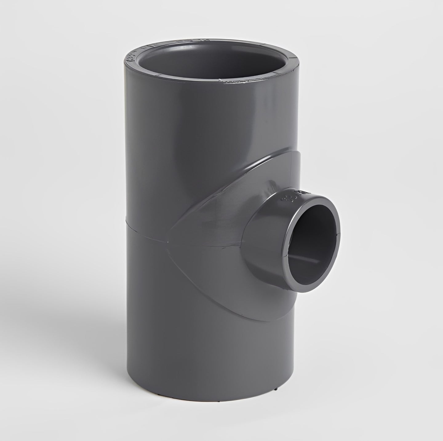 PVC Plain Reducing Tee Metric pipe fitting for creating three-way branches in piping systems.