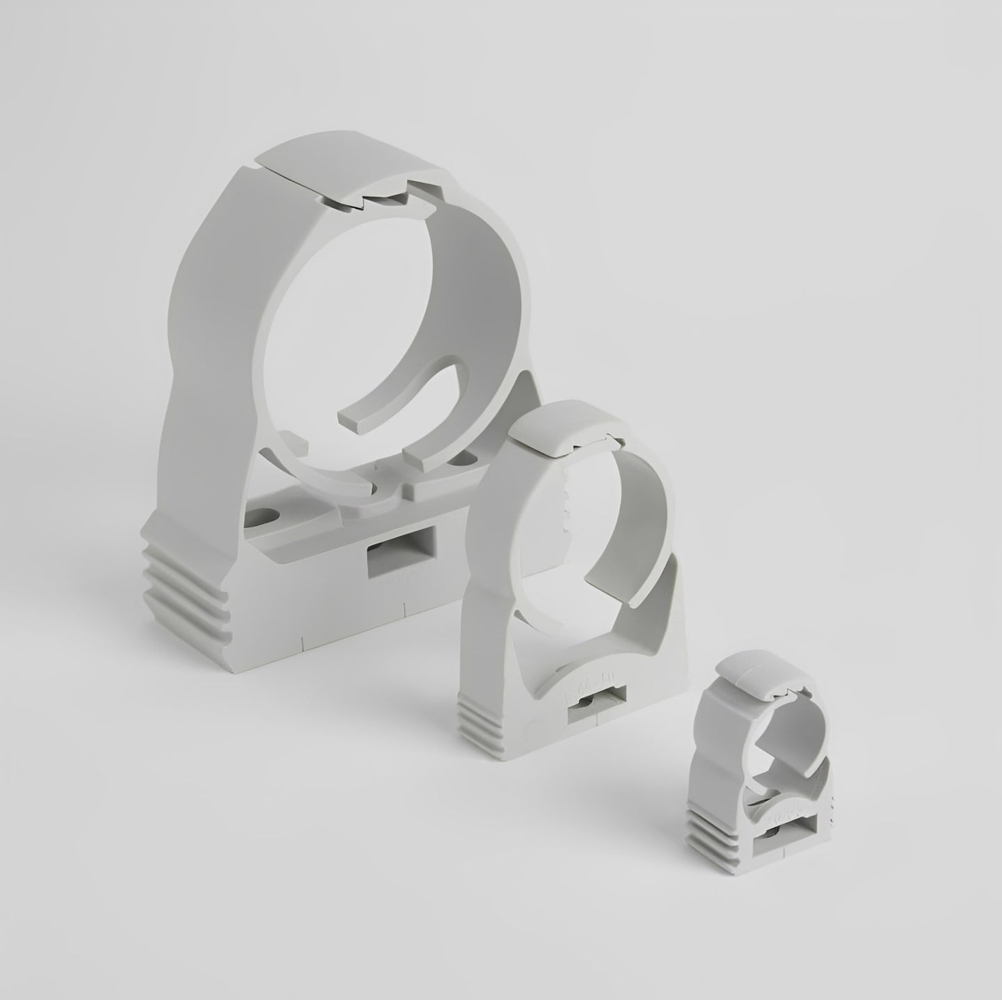 Quick Clamp Pipe Clip - Polypropylene Imperial & Metric in various sizes for secure pipe installation.