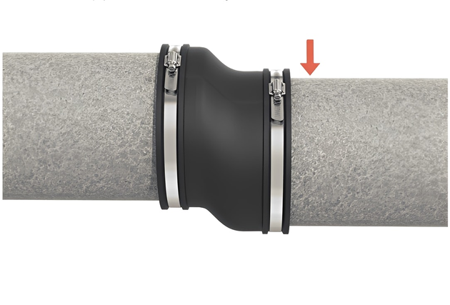 Fernco SC175 Shear-Banded Pipe Coupling 150-175mm installed on drainage pipes for secure and flexible sealing.