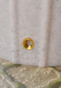 Cosmo White Marble Water Butt Planter - 200L Decorative Tank detail showing gold fitting and textured marble surface.